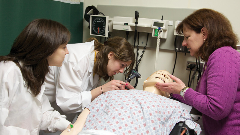 Nursing Students Tending to a Patient